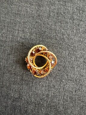 Gold-Tone Brown Crystal Knot Brooch